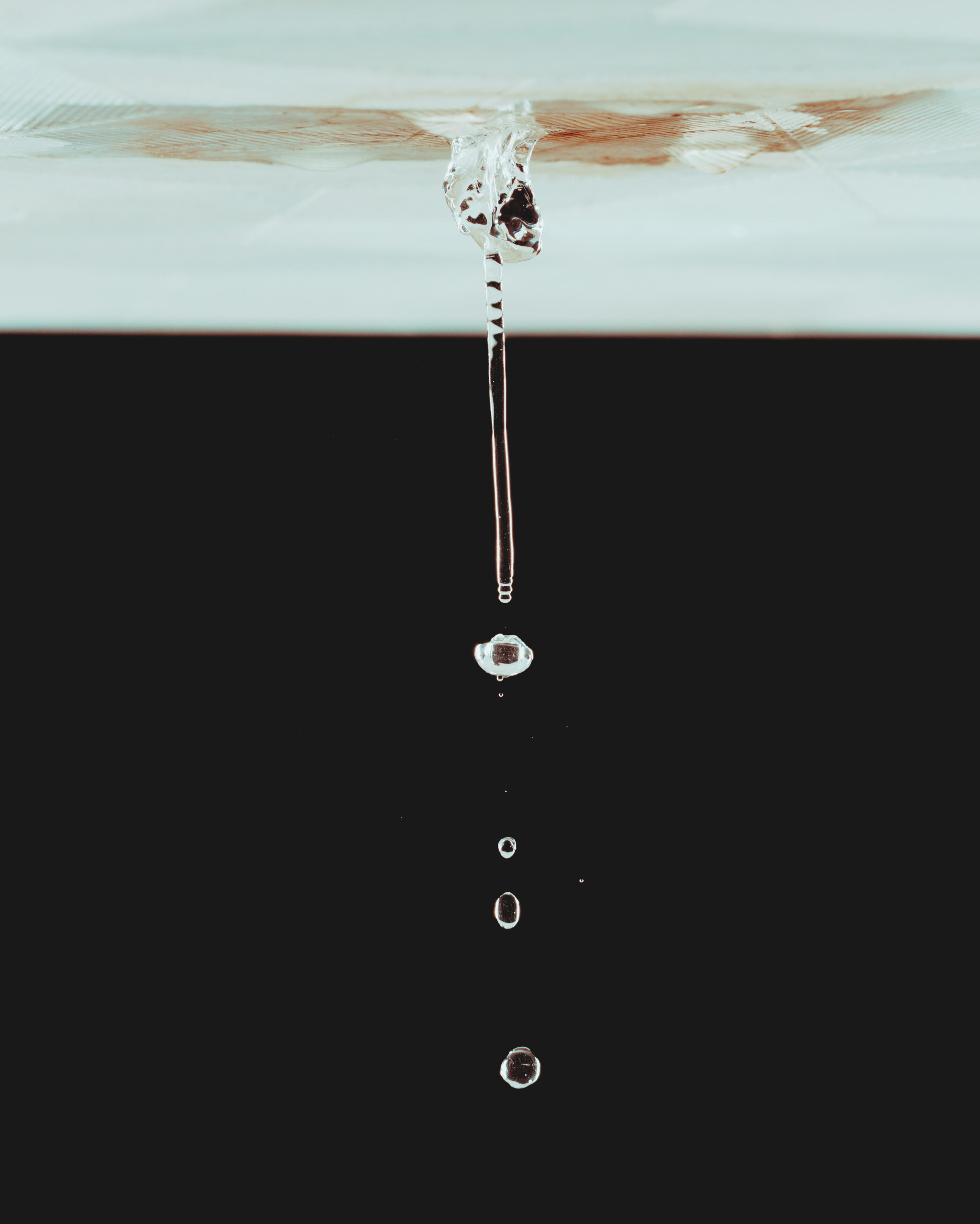 Water leaking from a ceiling, symbolizing revenue leaking from a sales pipeline.